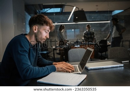 In the office, a skilled programmer and engineer dives into complex coding tasks, single-handedly driving technological advancements and finding innovative solutions.	
