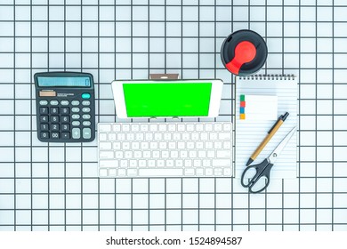 Office Stationaries On School Table Desk On Checkered Background. Note Pad, Black Page For Text, Pen, Re-usable Coffee Cup, Scissor, Sticky Pad, Calculator, Green Screen Tablet, Keyboard.