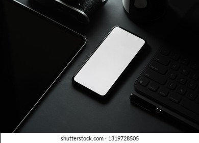 Office Stationery With Blank Screen Mobile Smart Phone On Dark Background.