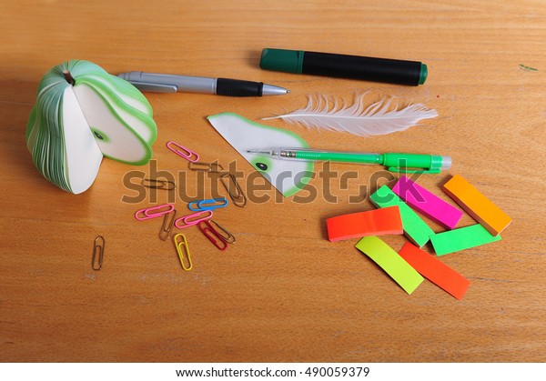 Office Supplies On Old Scratched Desk Stock Photo Edit Now 490059379