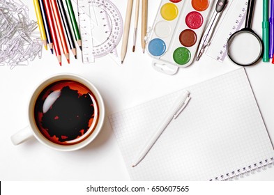 Office supplies and tea on white background isolation background