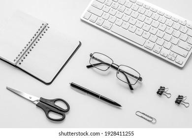 Office table desk flat lay. Workspace with laptop and office supplies