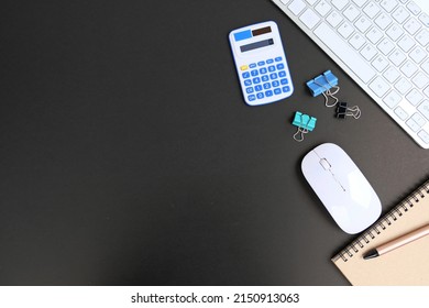 Office table desk, flat lay, top view On the desk background, there is a blank laptop, office supplies, a pencil, and a coffee cup. Conecpts for business and educationOffice table desk, flat lay, top 