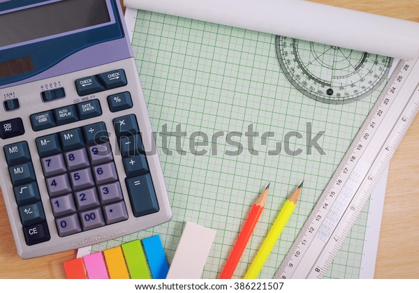 Office table desk with set of Office Stationery\
or Math Supplies.