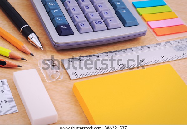 Office table desk with set of Office Stationery\
or Math Supplies.