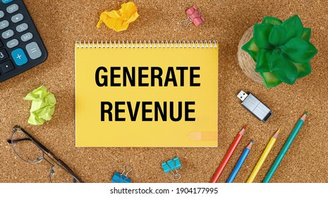 Office table and notebook with the text Generate Revenue