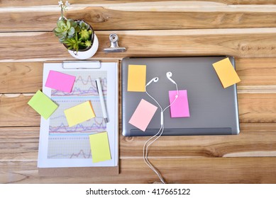 Office table with notepad and computer