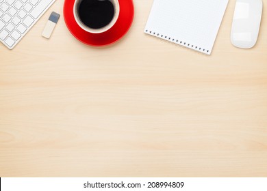 Office Table With Notepad, Computer And Coffee Cup. View From Above With Copy Space