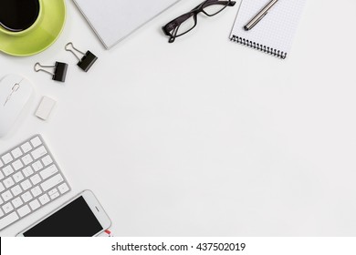 Office Table Top View With Computer, Coffee Cup, Notepad, Smartphone, Keyboard And Mouse.