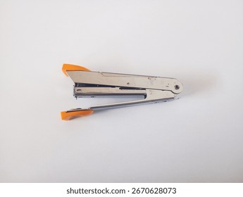 office tool stapler and white background 