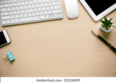 Office tools on wooden background
