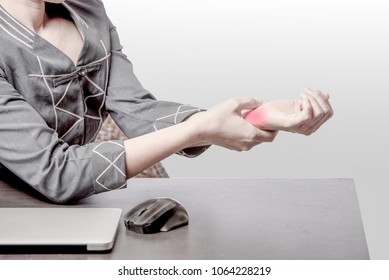 Office Woman Pain At Right Wrist, Case Woman Woking At Table And Pain At Right Wrist Because Of Hard Work, Office Syndrome Concept 