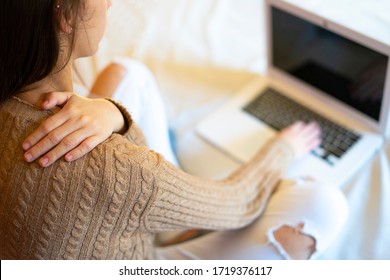 Office Worker With Back Pain From Working With The Computer. Ergonomics At Work.