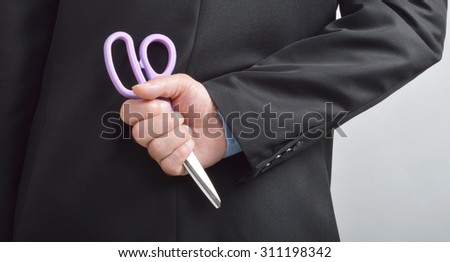 Office worker back stabber