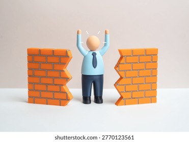 An office worker breaks down a wall to achieve a breakthrough. Innovation and progress overcome bureaucracy. Change management drives efficiency and new opportunities in business.