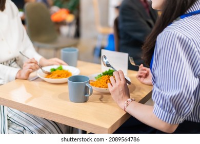 Office Worker Having Lunch At Cafeteria