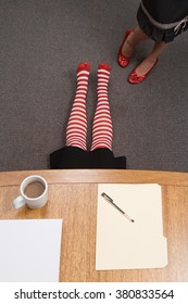 Office Worker Hiding Under A Desk