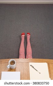 Office Worker Hiding Under Desk