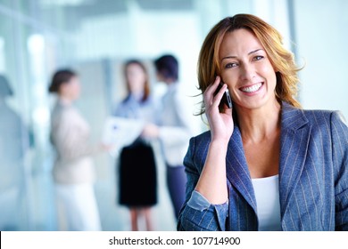 Office Worker Making A Phone Call Understanding The Importance Of Positive Attitude