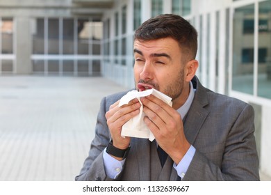 Office Worker Sneezing Close Up