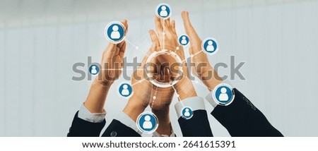 Office worker team stacking hand together symbolize successful group of business partnership and strong collective unity teamwork in community workplace in panoramic banner. Shrewd Amity