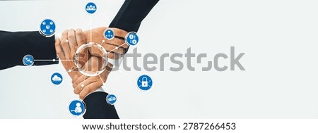 Office worker team stacking hand together symbolize successful group of business partnership and strong collective unity teamwork in community workplace in panoramic banner. Shrewd Amity
