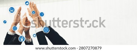 Office worker team stacking hand together symbolize successful group of business partnership and strong collective unity teamwork in community workplace in panoramic banner. Shrewd Amity