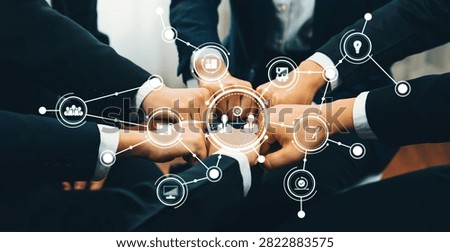 Office worker team stacking hand together symbolize successful group of business partnership and strong collective unity teamwork in community workplace in panoramic banner. Shrewd Amity