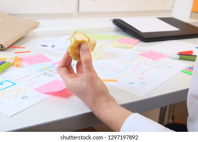 Office worker in ux development snacking apple in the workplace - Powered by Shutterstock - Get 15% off with code: PIKWIZARD15