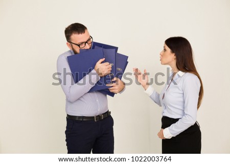 Office workers, a man and woman head