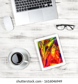 Office workplace creative flat lay. Laptop, tablet pc, cup of coffee