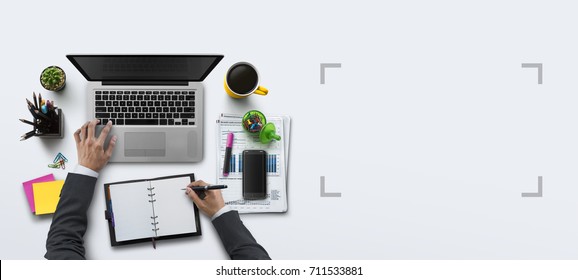 Office workplace with laptop, notebook, hand, office supplies, on white background. Solution, business planning, financial analysis, accounting, start up or working flat lay top view concept. - Powered by Shutterstock