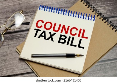 Office Workplace Table With Glasses And Pen The Text CoUNCIL TAX BILL