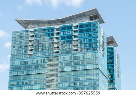 Offices building or apartment building with sky background.