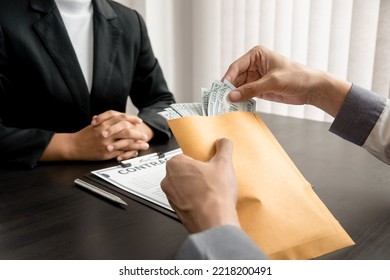 The officials are counting the bribes that have come from the lack of transparency, Corruption concept. - Shutterstock ID 2218200491