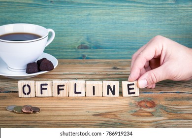 offline. Wooden letters on the office desk, informative and communication background