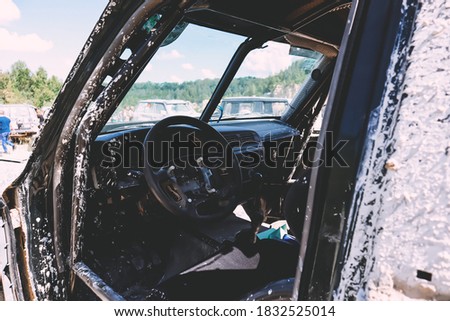 Offroad car in the swamp. Redesigned car for competitions. Custom buggy. Big wheels.