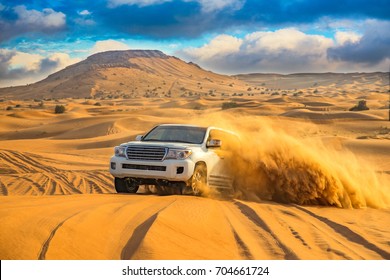 Offroad desert safari in Dubai. (dune bashing). - Shutterstock ID 704661724