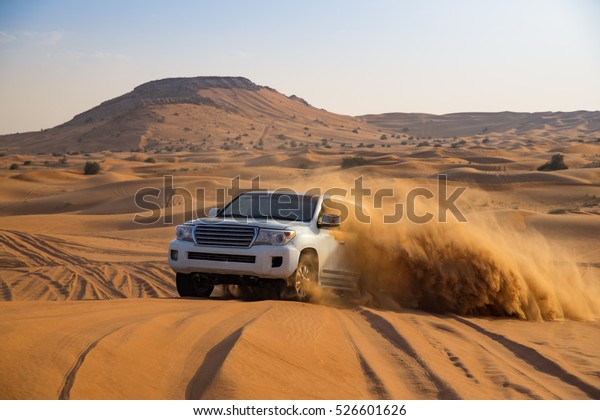 Offroad desert\
safari in Dubai. (dune\
bashing).