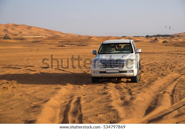 Offroad desert\
safari in Dubai. (dune\
bashing).