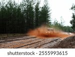 Offroad in the forest with UTV in the rain