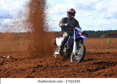 Off-road Motorbike In Extreme Dirt. A Lot Of Flying Dirt.