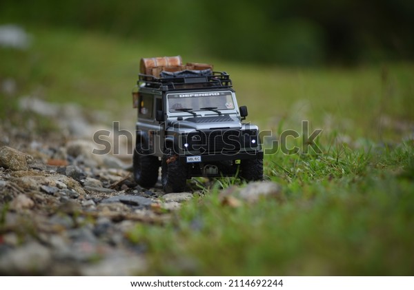 Offroad remote control car\
Land rover defender in the forest. Bengkulu Indonesia. January 28,\
2022