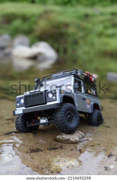 Offroad remote control car\
Land rover defender in the forest. Bengkulu Indonesia. January 28,\
2022