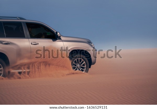 Off-road safari on the golden sands\
of the desert on a car in Walvis Bay. Namibia.\
04.02.2020