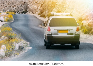 Off-road SUV Driving On The Rock Mountain Road In Leh,India.