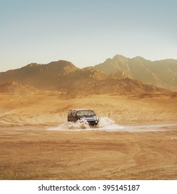 Offroad SUV Riding In The Desert