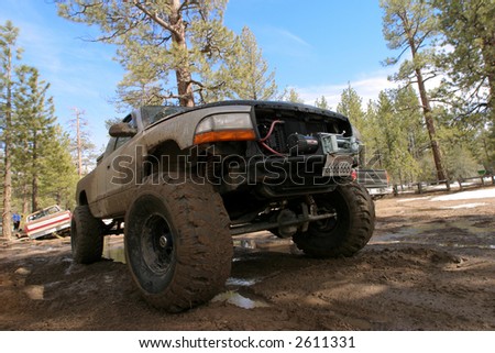 Offroading monster truck in the forest