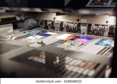 Offset printing machine, inside view, printing sheets, printing