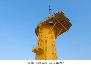 Offshore Cargo Transfer Operation On Wind Turbine Foundation Platform With Generator Hanging On Crane Wire